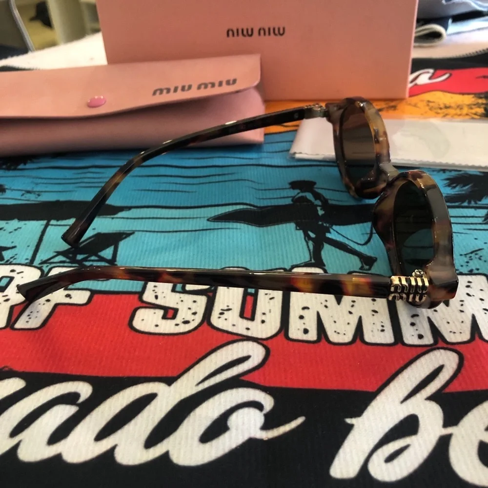 Miu Miu Tortoiseshell Oval Sunglasses - Brown Lenses